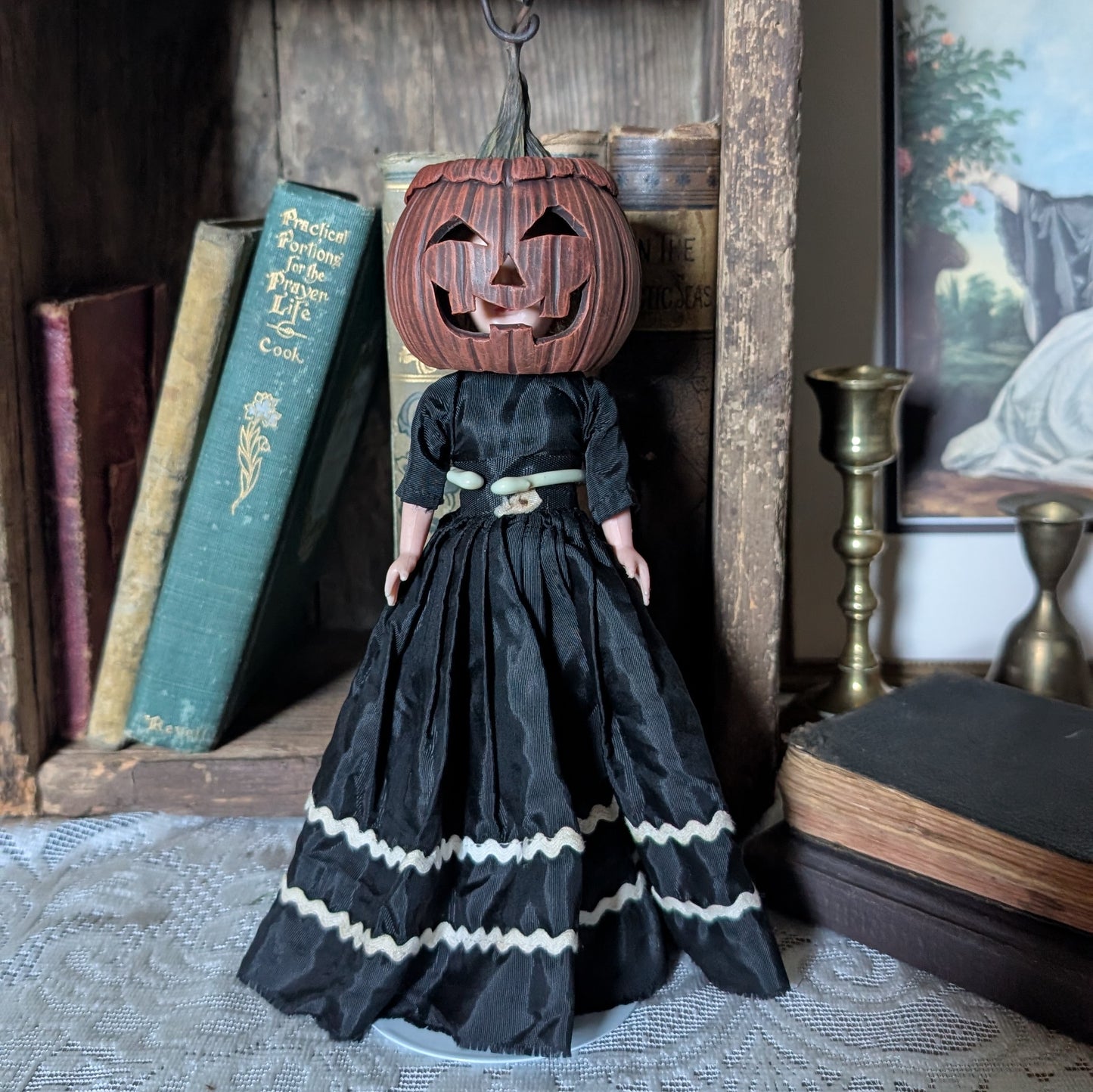 Spooky Halloween doll with pumpkin