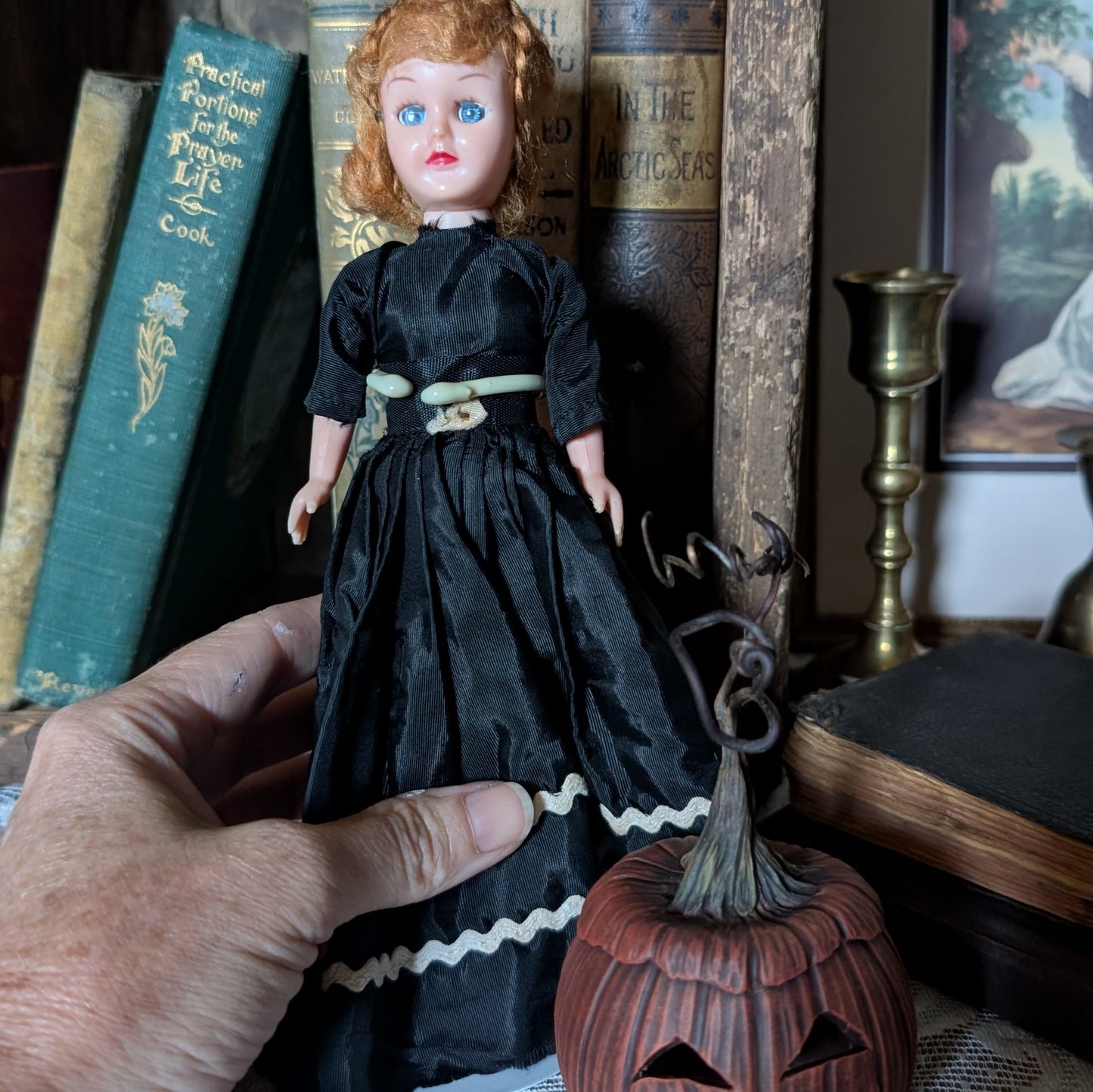 Spooky Halloween doll with pumpkin