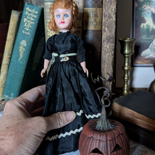 Spooky Halloween doll with pumpkin