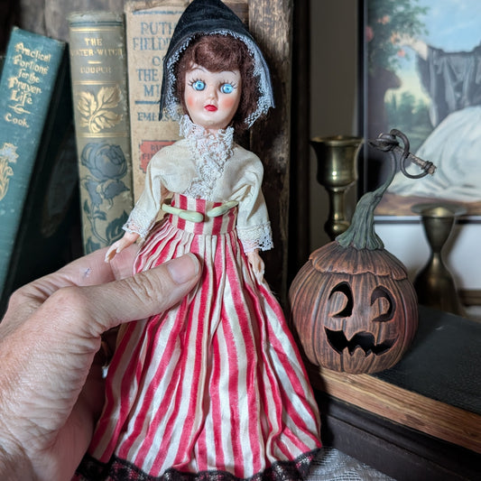 Spooky Halloween doll with pumpkin