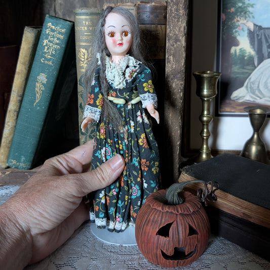 Spooky Halloween doll with pumpkin