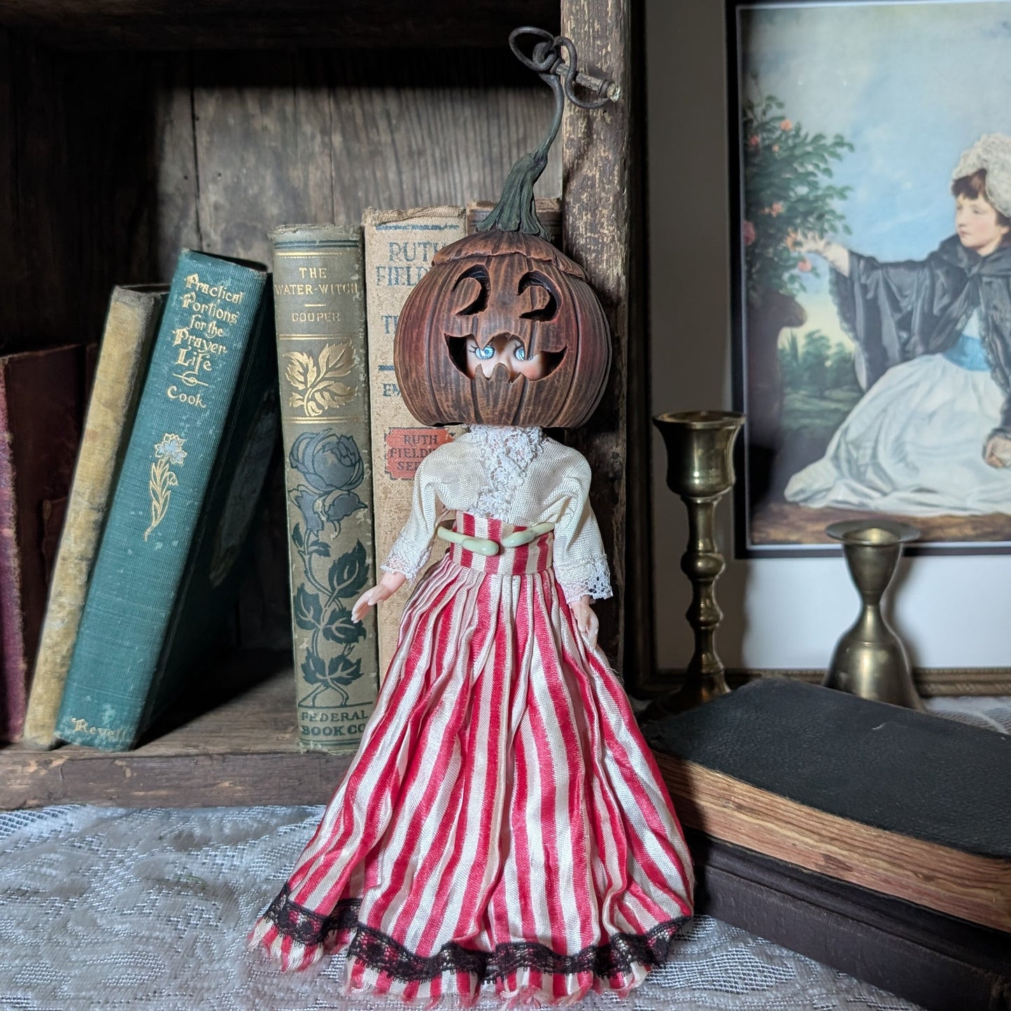 Spooky Halloween doll with pumpkin